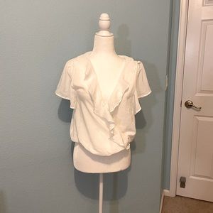 Silky white ruffle blouse